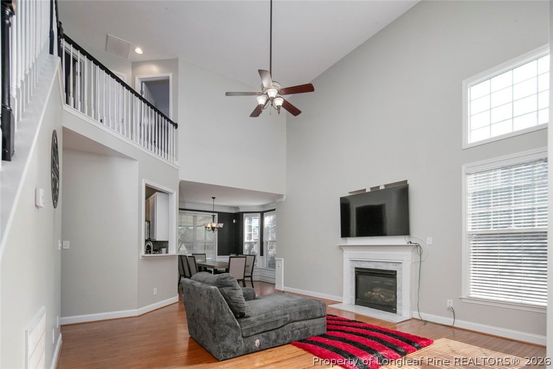 98 Cottswold Lane Spring Lake, NC 28390 - Photo 12 of 30 a living room with furniture flat screen tv and a fireplace