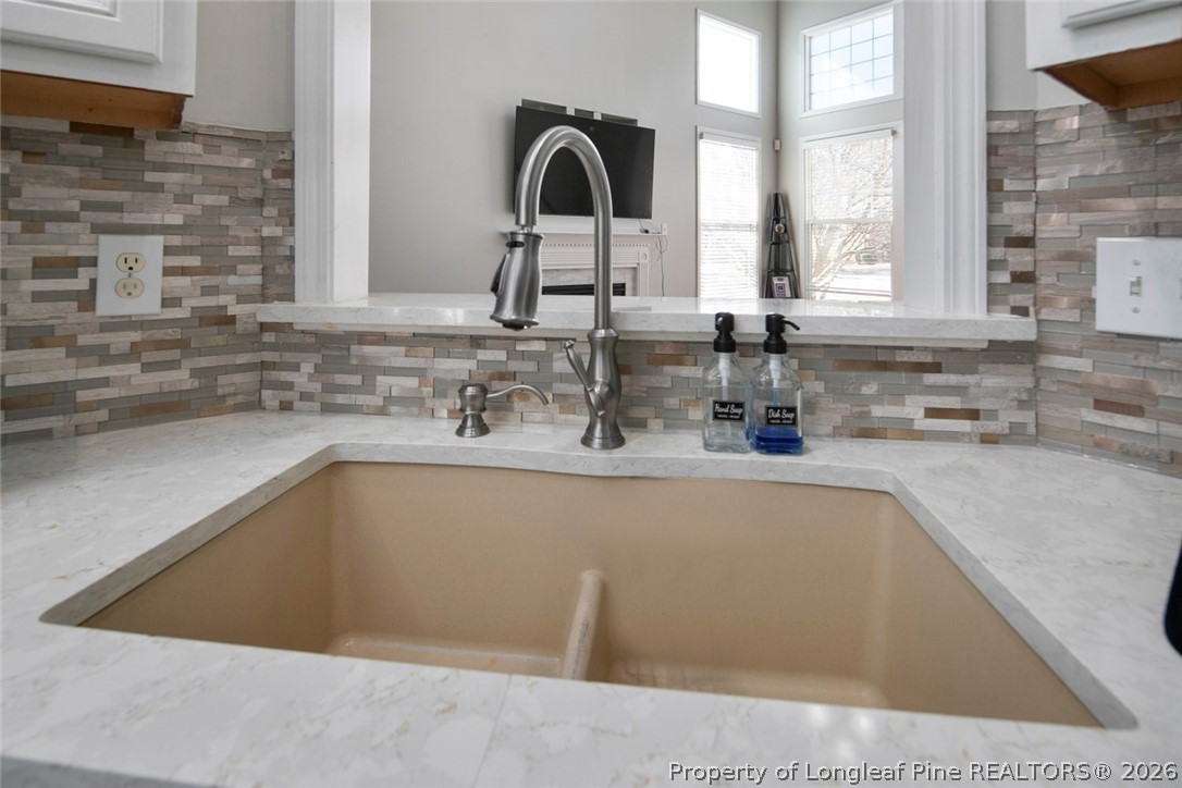 98 Cottswold Lane Spring Lake, NC 28390 - Photo 20 of 30 a kitchen with a sink and a window