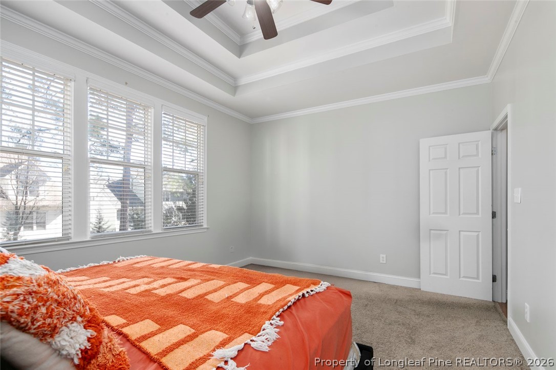 98 Cottswold Lane Spring Lake, NC 28390 - Photo 24 of 30 a bedroom with a bed and a window