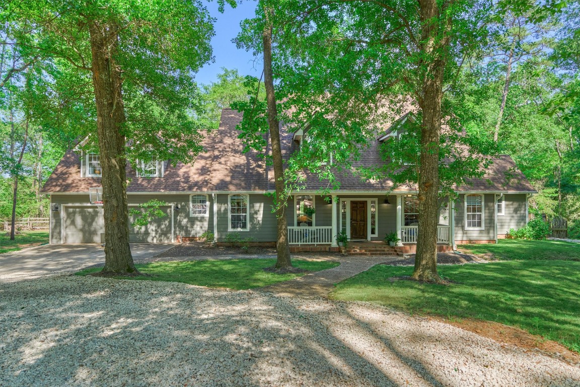 28694 West Fm 1097 Road Montgomery, TX 77356 - Photo 48 of 50 Offering just over 3,000 square feet, the home has four bedrooms, four and a half baths, and an open floor plan perfect for entertaining!