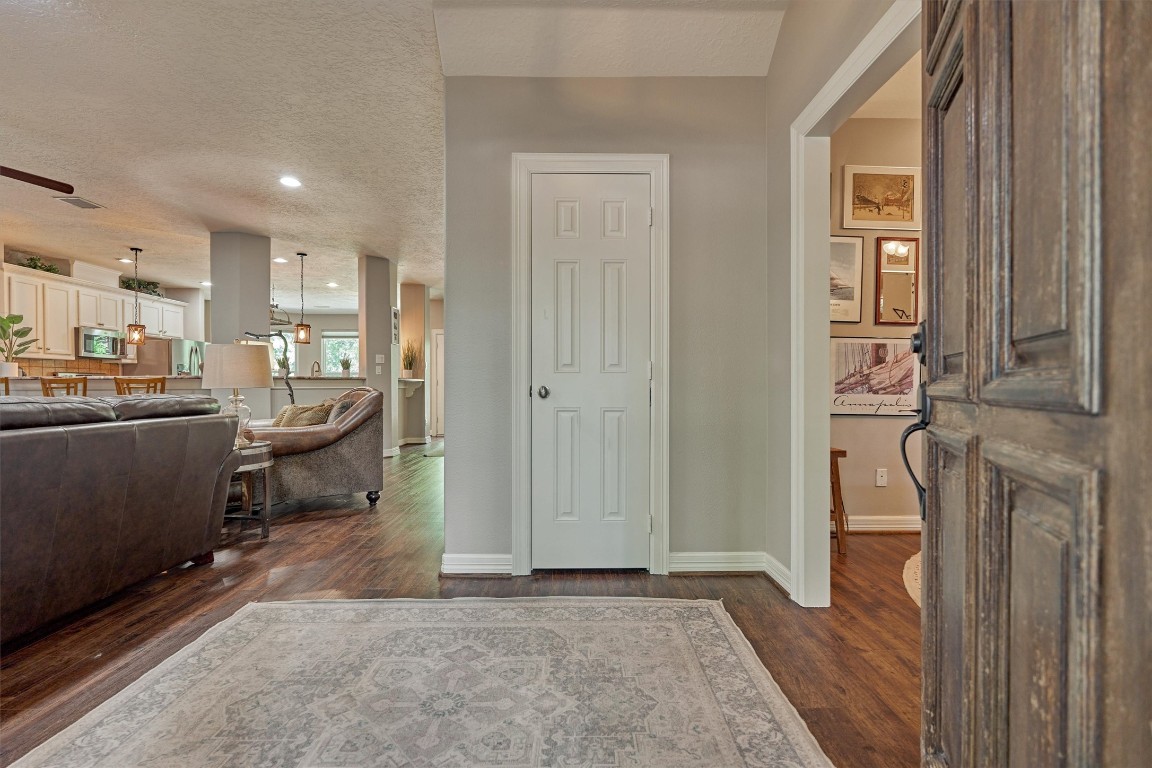 28694 West Fm 1097 Road Montgomery, TX 77356 - Photo 14 of 50 Entering the home, the living room is situated to the left and the study is on the right.