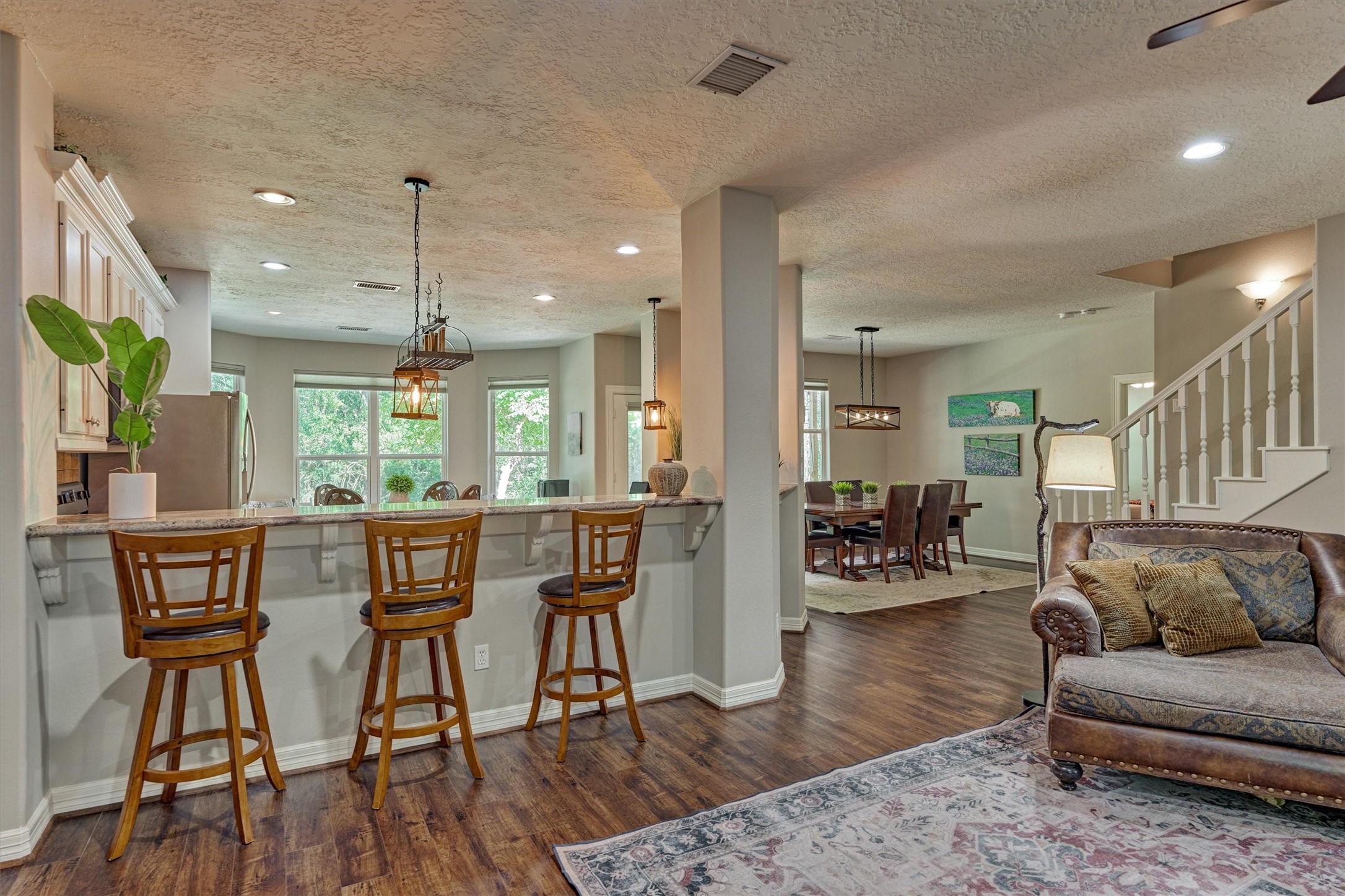28694 West Fm 1097 Road Montgomery, TX 77356 - Photo 20 of 50 a view of a dining room with furniture window and wooden floor