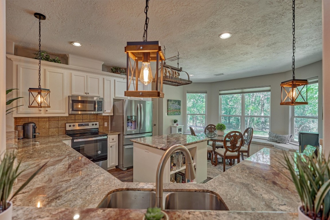 28694 West Fm 1097 Road Montgomery, TX 77356 - Photo 22 of 50 Lots of counter space in this island kitchen!