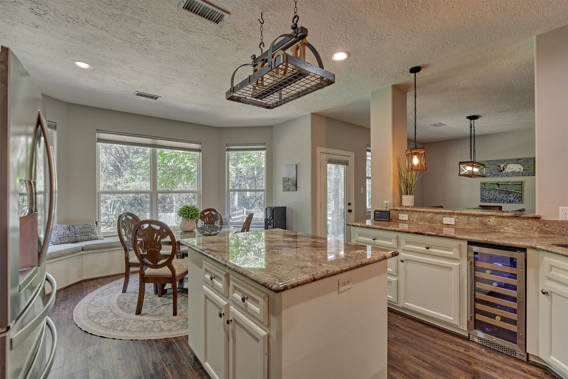 28694 West Fm 1097 Road Montgomery, TX 77356 - Photo 25 of 50 a open kitchen with stainless steel appliances granite countertop a stove and a sink