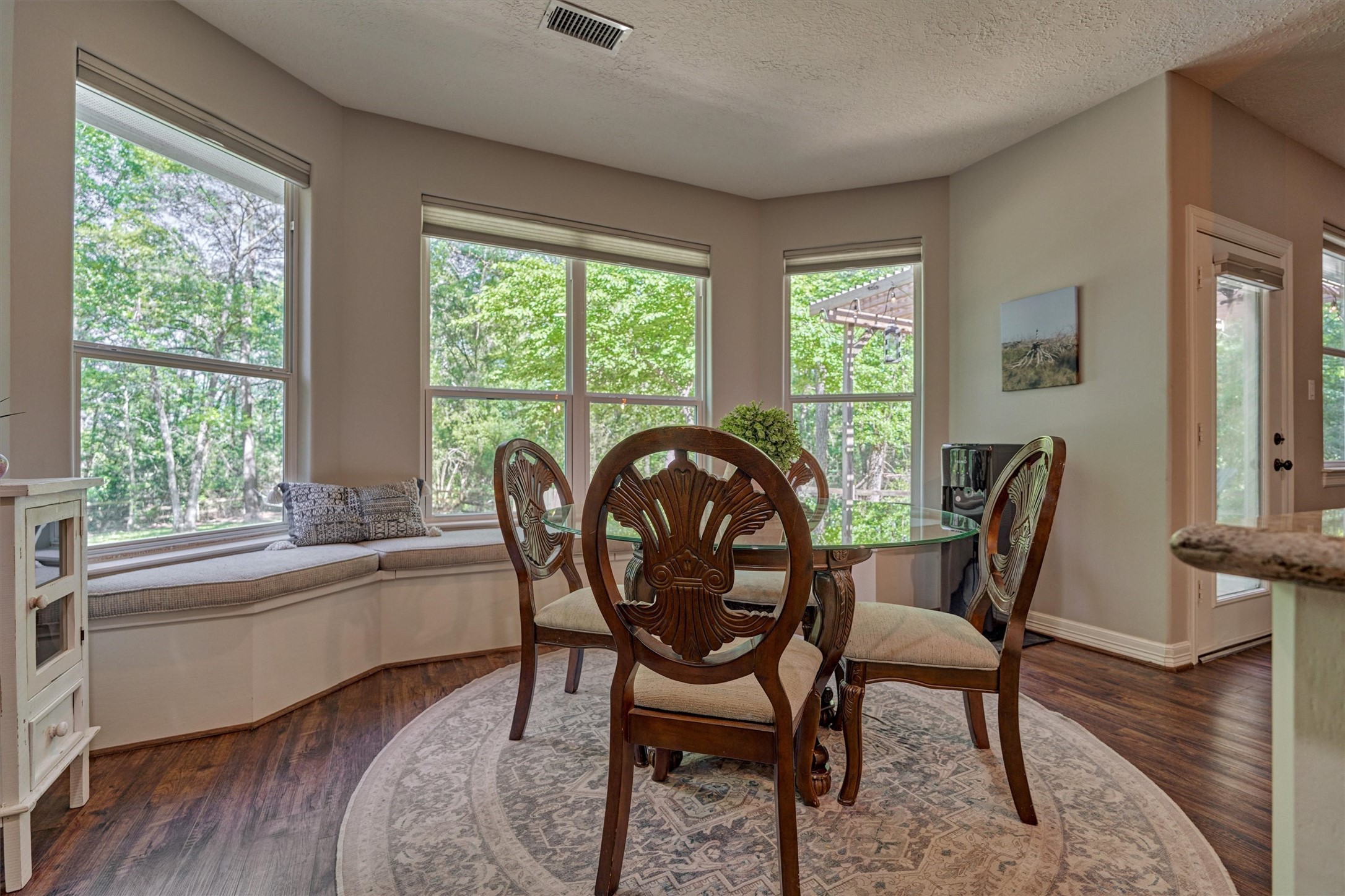 28694 West Fm 1097 Road Montgomery, TX 77356 - Photo 26 of 50 a view of a dining room with furniture window and wooden floor