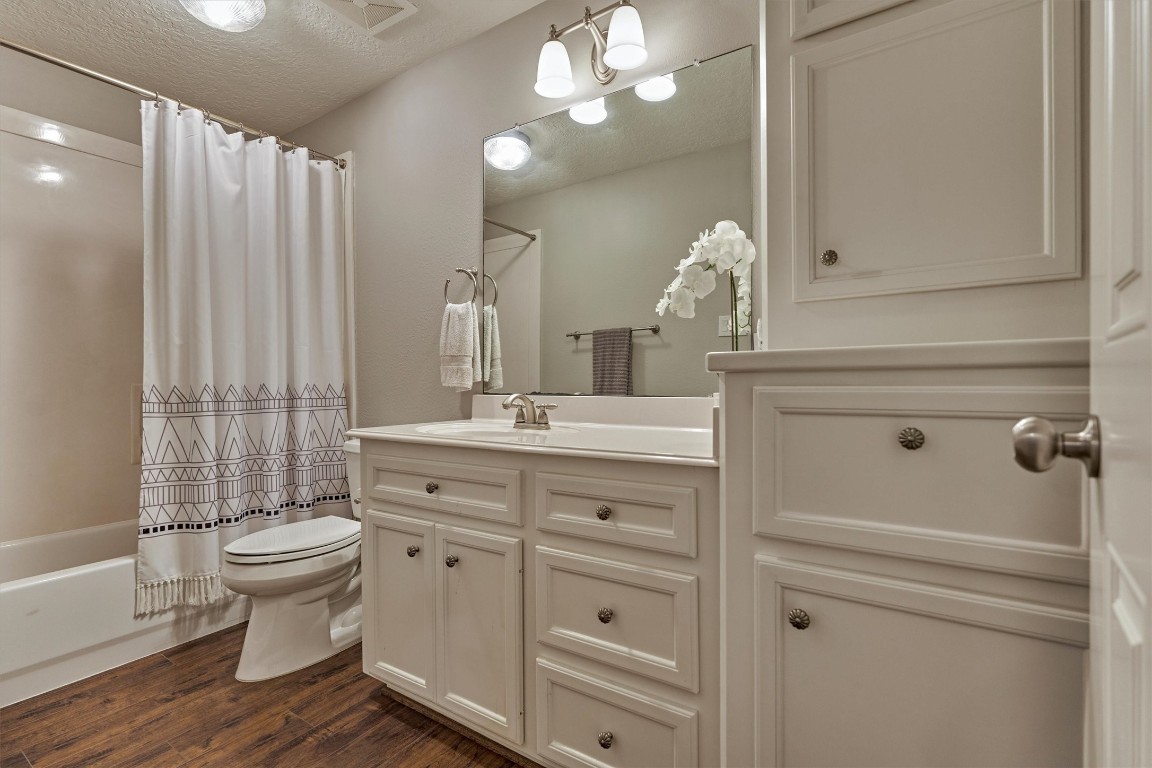 28694 West Fm 1097 Road Montgomery, TX 77356 - Photo 38 of 50 Ensuite bath with lots of storage and tub/shower combo.