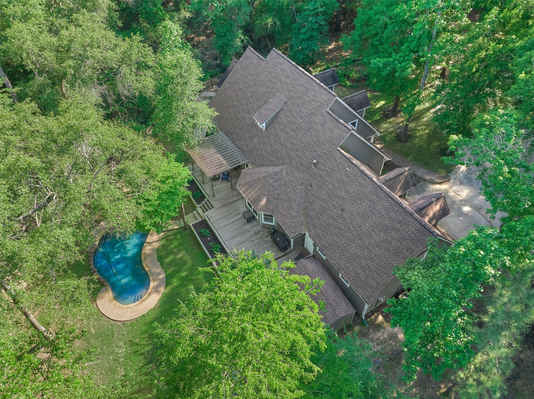 28694 West Fm 1097 Road Montgomery, TX 77356 - Photo 7 of 50 an aerial view of a house with garden space and street view