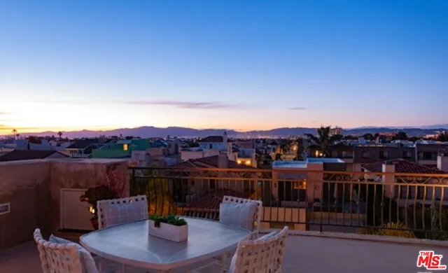 a view of a terrace with furniture