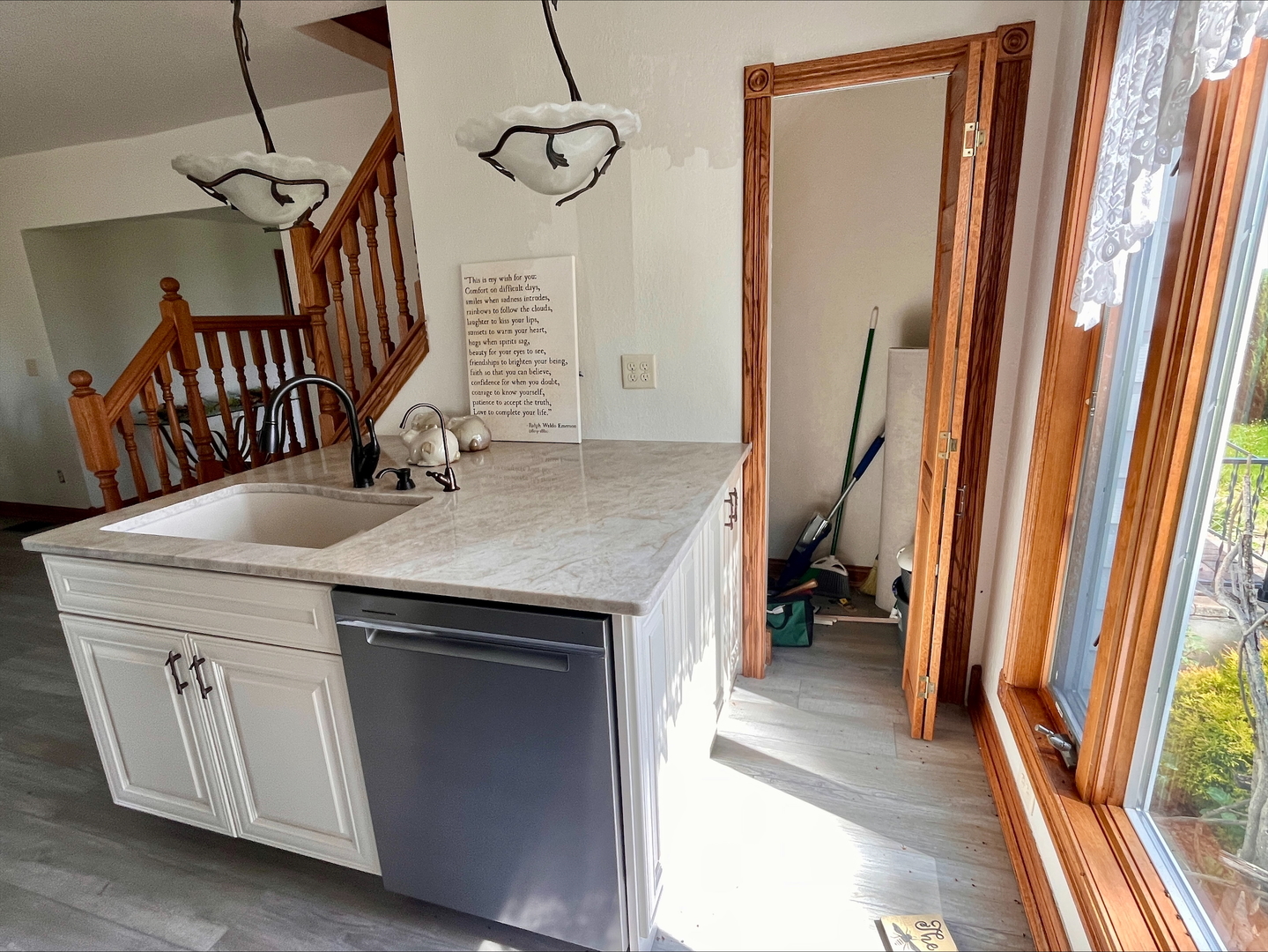 1116 East 2300 North Road Danforth, IL 60930 - Photo 11 of 32 a kitchen with a sink and a refrigerator