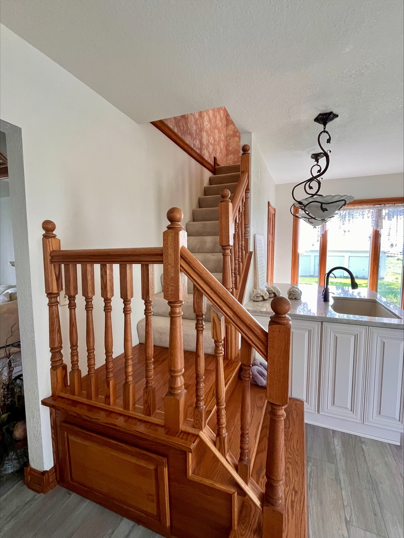 1116 East 2300 North Road Danforth, IL 60930 - Photo 26 of 32 a view of entryway with wooden floor