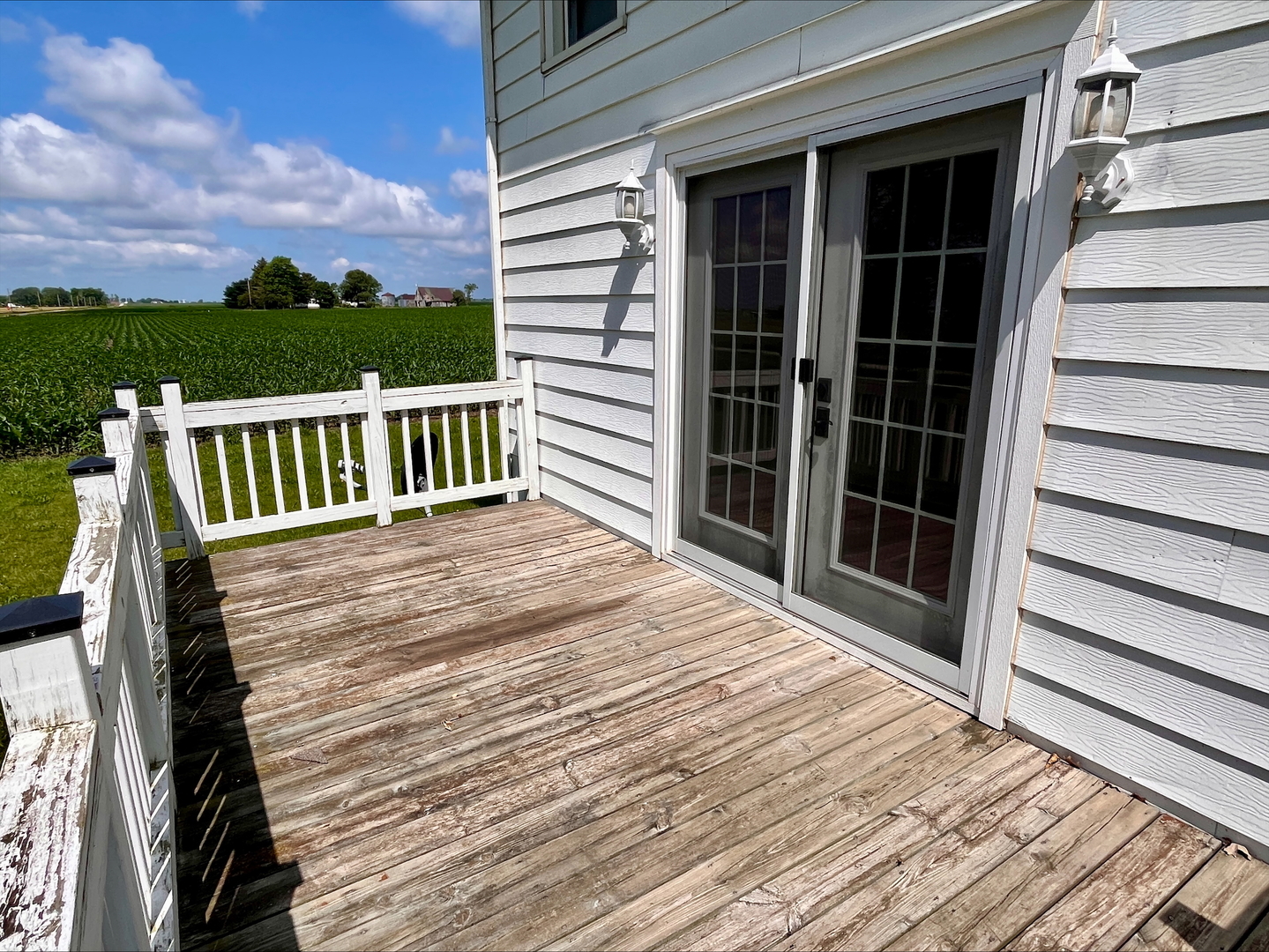1116 East 2300 North Road Danforth, IL 60930 - Photo 5 of 32 a view of a balcony with wooden floor