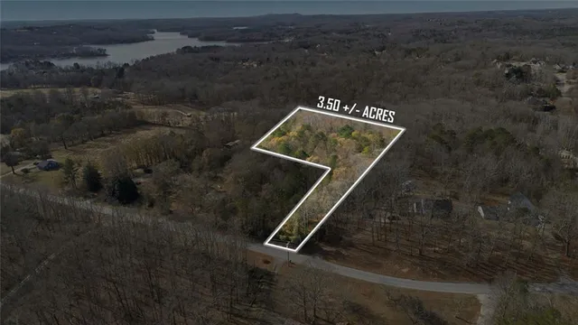 an aerial view of house with yard