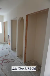 a view of a kitchen with granite countertop a couch