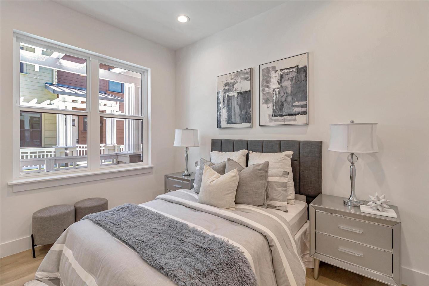 1982 Montecito Avenue Mountain View, CA 94043 - Photo 14 of 30 a bedroom with a bed and a large window