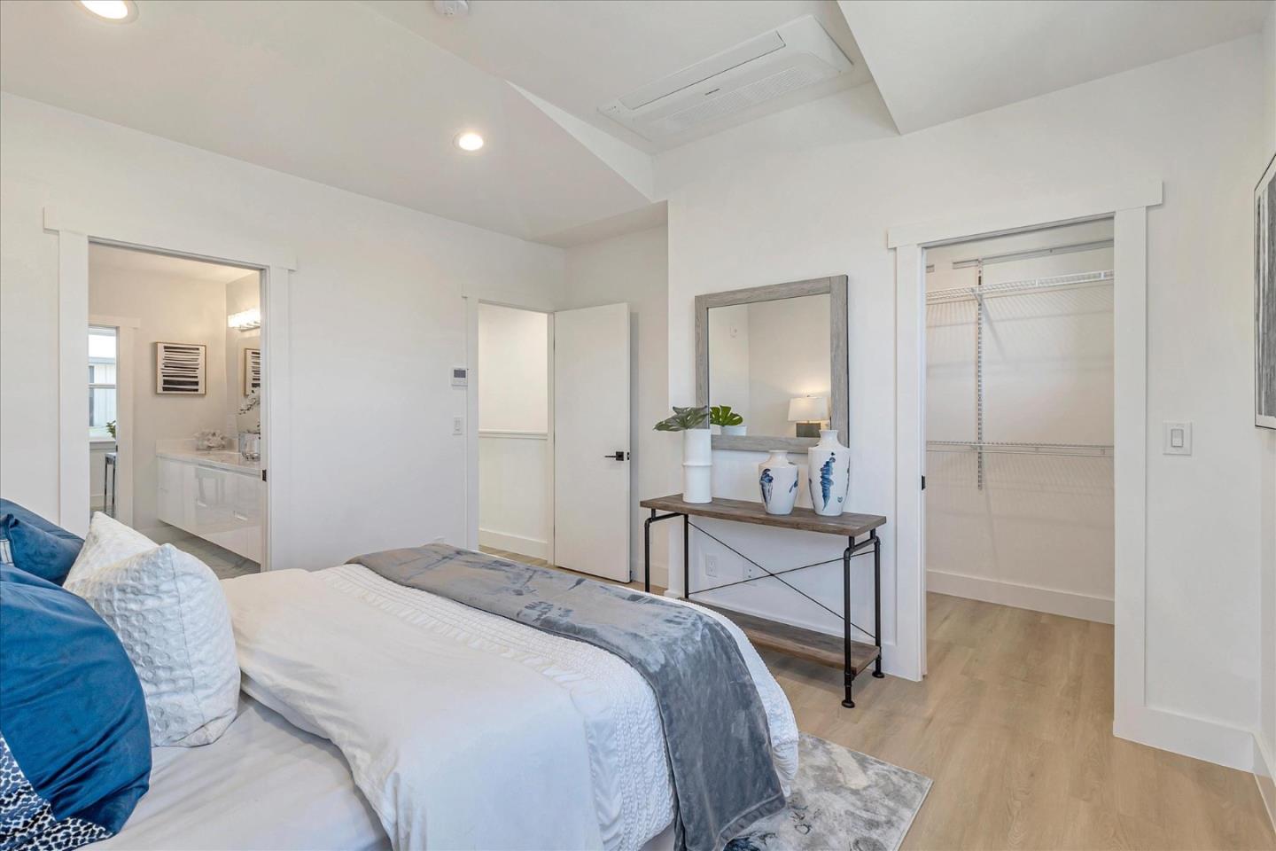 1982 Montecito Avenue Mountain View, CA 94043 - Photo 17 of 30 a bedroom with a bed and a table in it