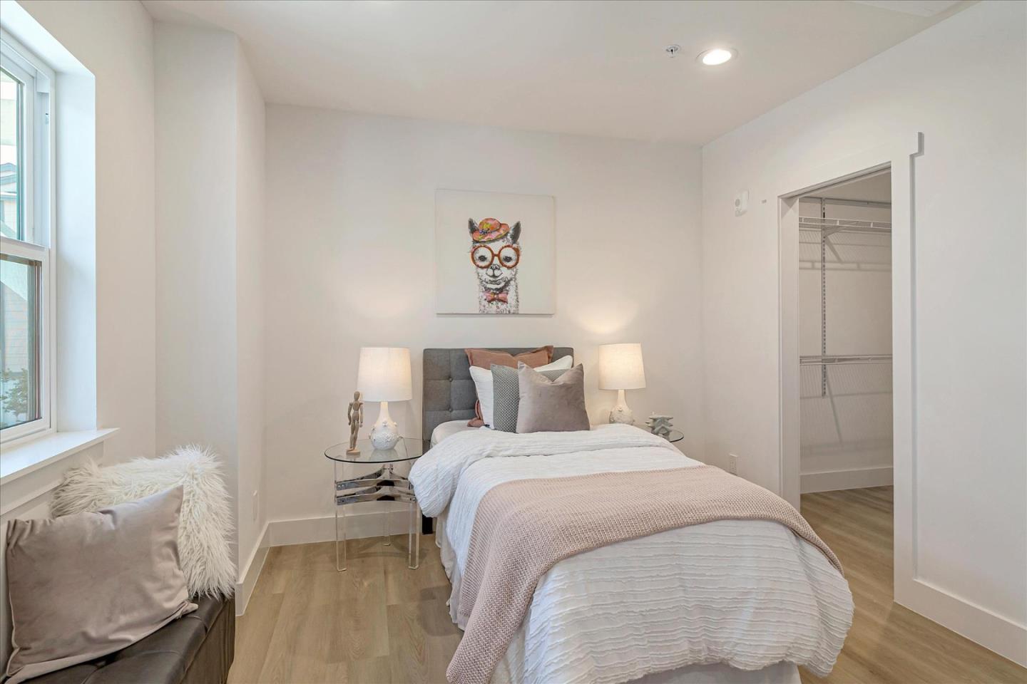 1982 Montecito Avenue Mountain View, CA 94043 - Photo 18 of 30 a bedroom with a bed and a window