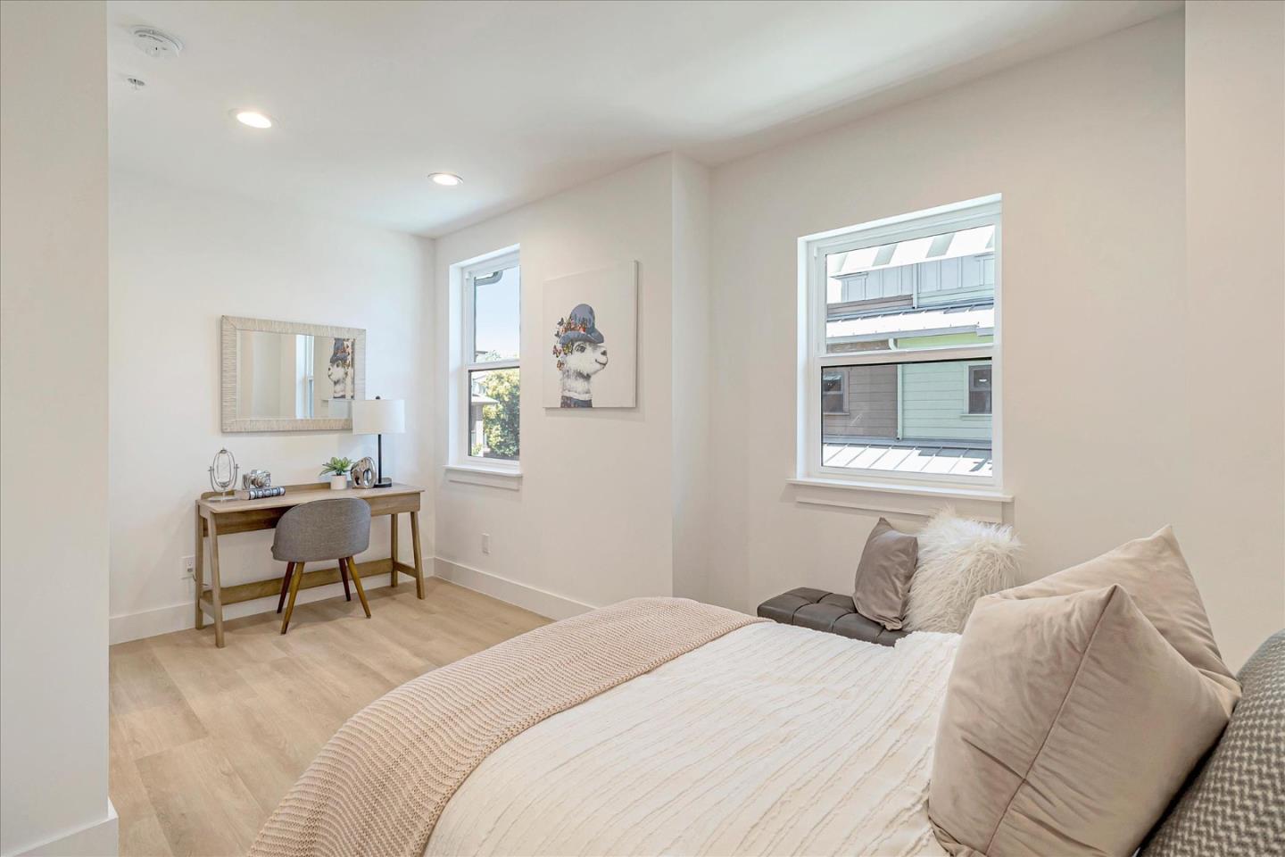 1982 Montecito Avenue Mountain View, CA 94043 - Photo 19 of 30 a bedroom with a bed and a table in it