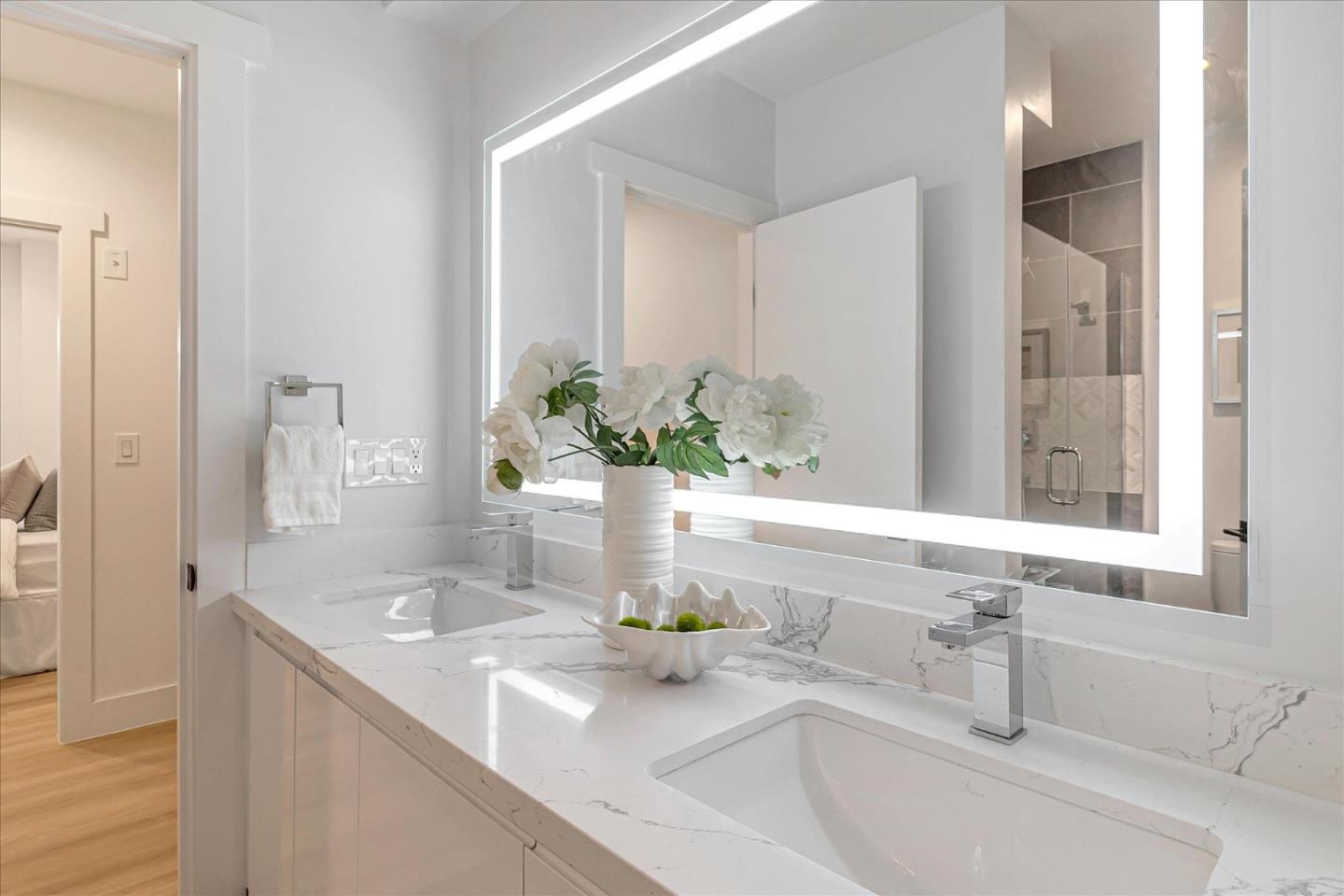 1982 Montecito Avenue Mountain View, CA 94043 - Photo 21 of 30 a bathroom with a sink and a mirror