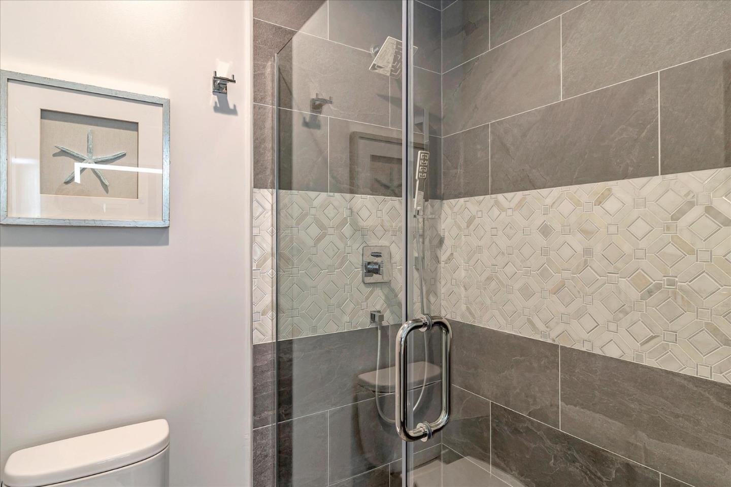 1982 Montecito Avenue Mountain View, CA 94043 - Photo 22 of 30 a bathroom with a shower and toilet