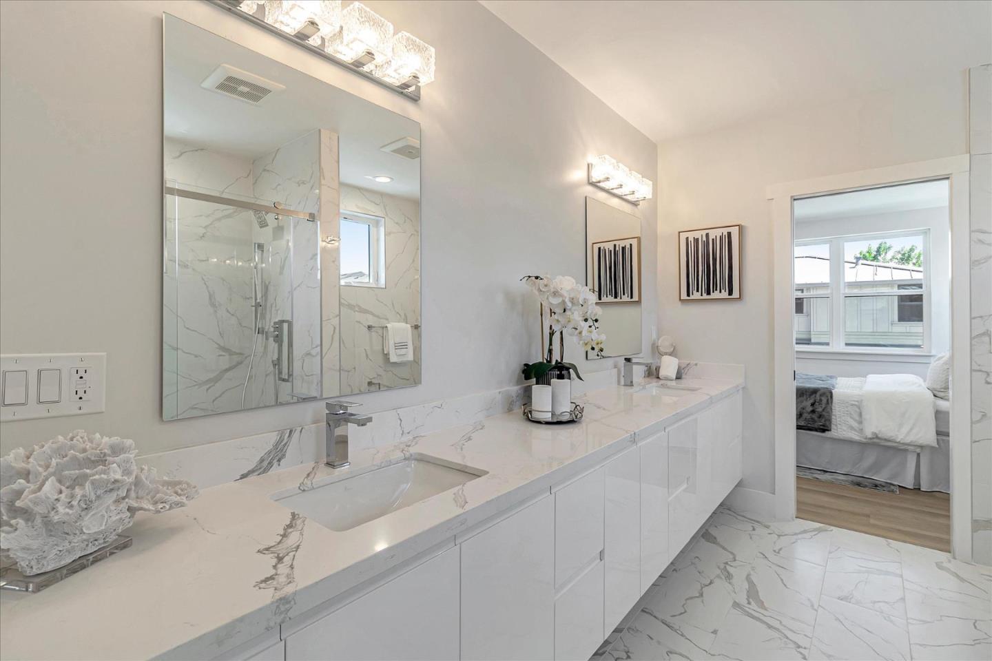 1982 Montecito Avenue Mountain View, CA 94043 - Photo 23 of 30 a bathroom with double vanity sinks and a mirror