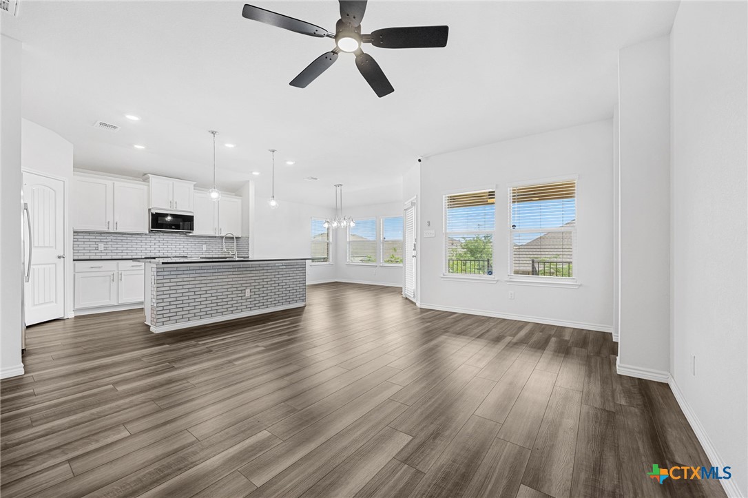 6166 Lavaca Drive Belton, TX 76513 - Photo 12 of 41 a view of kitchen with sink and wooden floor