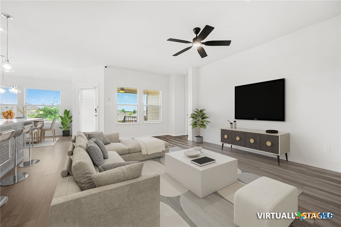 6166 Lavaca Drive Belton, TX 76513 - Photo 2 of 41 a living room with furniture and a flat screen tv
