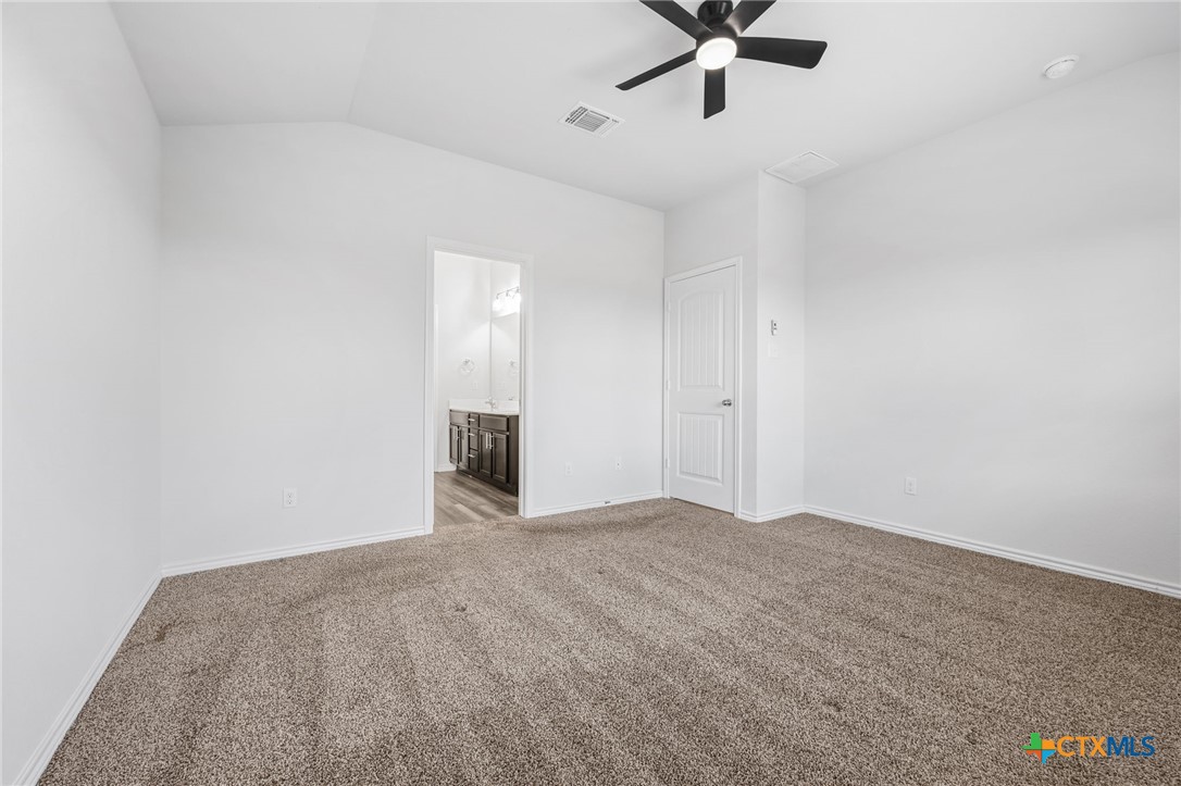6166 Lavaca Drive Belton, TX 76513 - Photo 21 of 41 an empty room with fan and windows