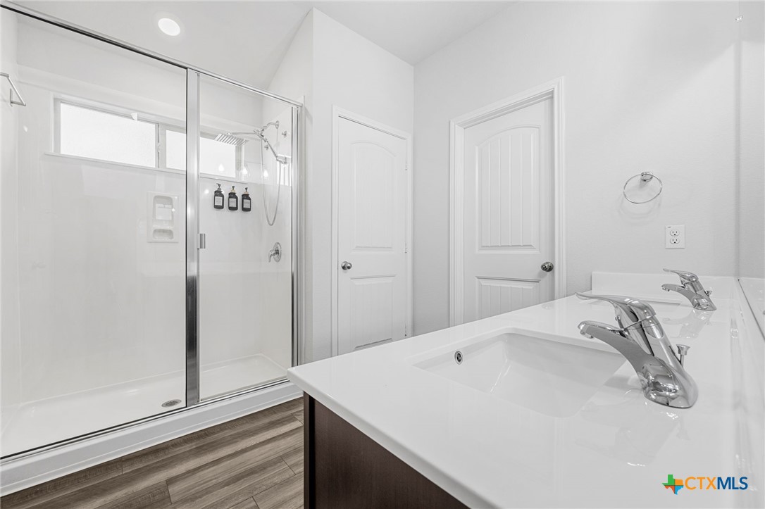 6166 Lavaca Drive Belton, TX 76513 - Photo 24 of 41 a bathroom with a bathtub and a shower