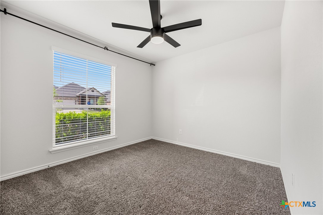 6166 Lavaca Drive Belton, TX 76513 - Photo 26 of 41 a view of a livingroom with a ceiling fan and window