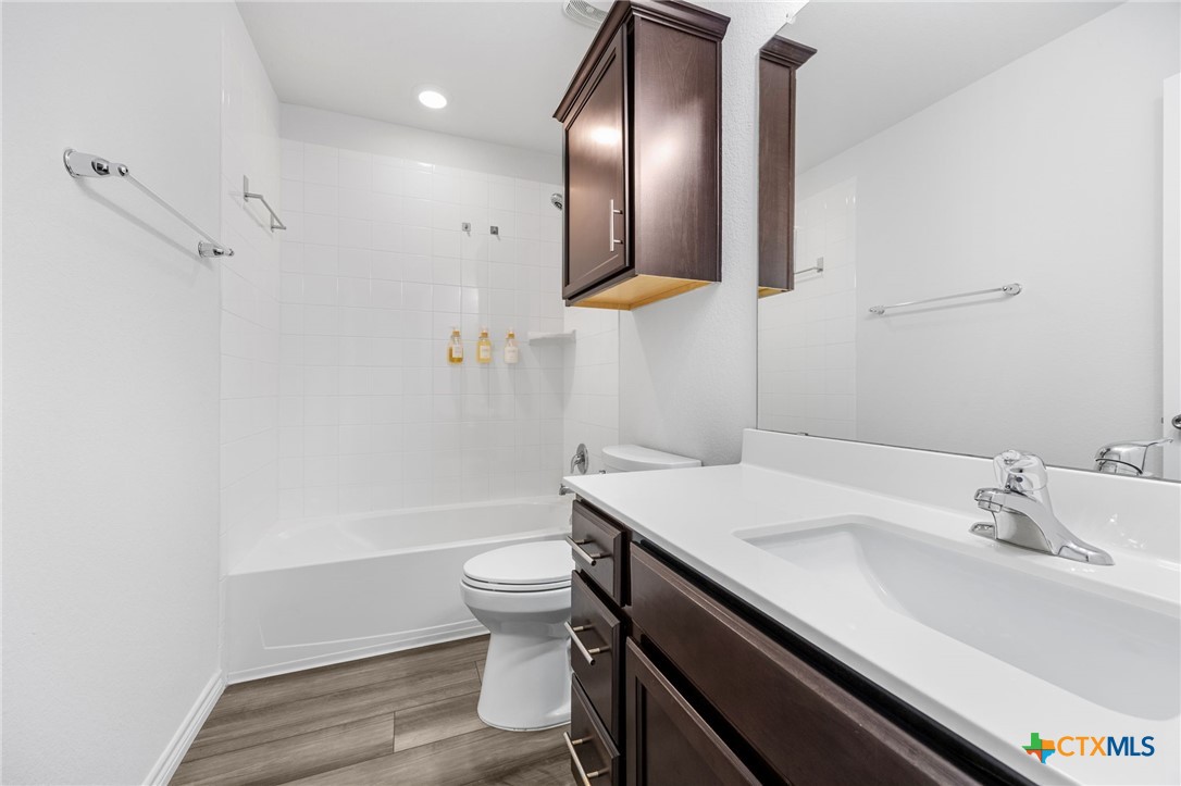 6166 Lavaca Drive Belton, TX 76513 - Photo 27 of 41 a bathroom with a sink and a mirror
