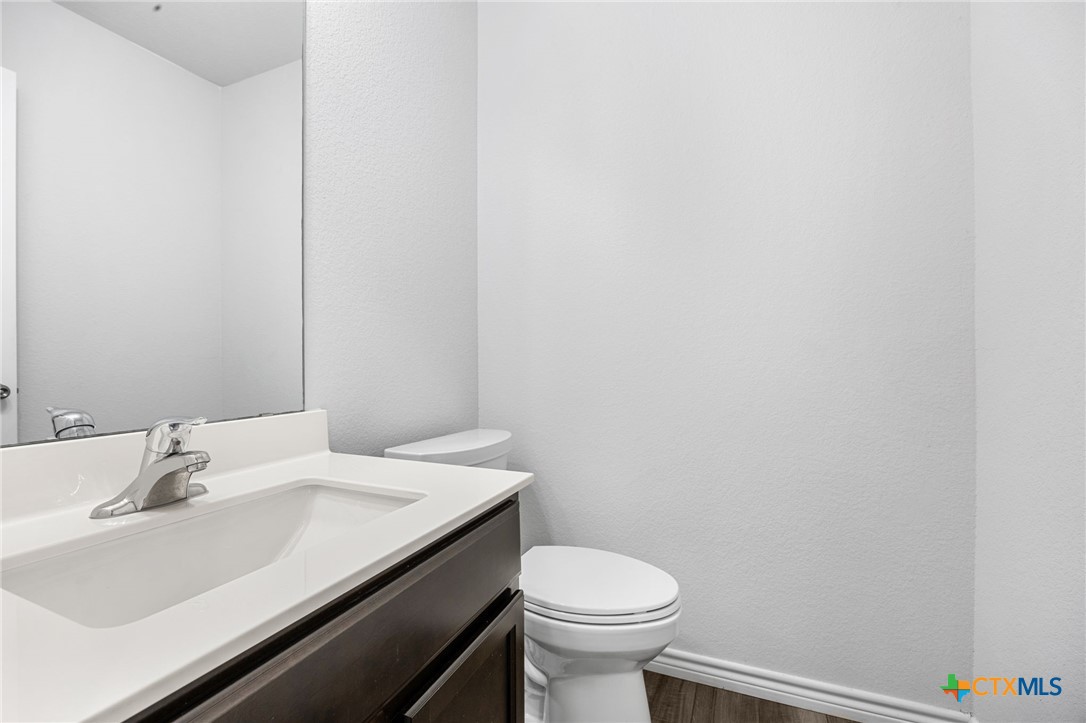 6166 Lavaca Drive Belton, TX 76513 - Photo 29 of 41 a bathroom with a sink and a toilet