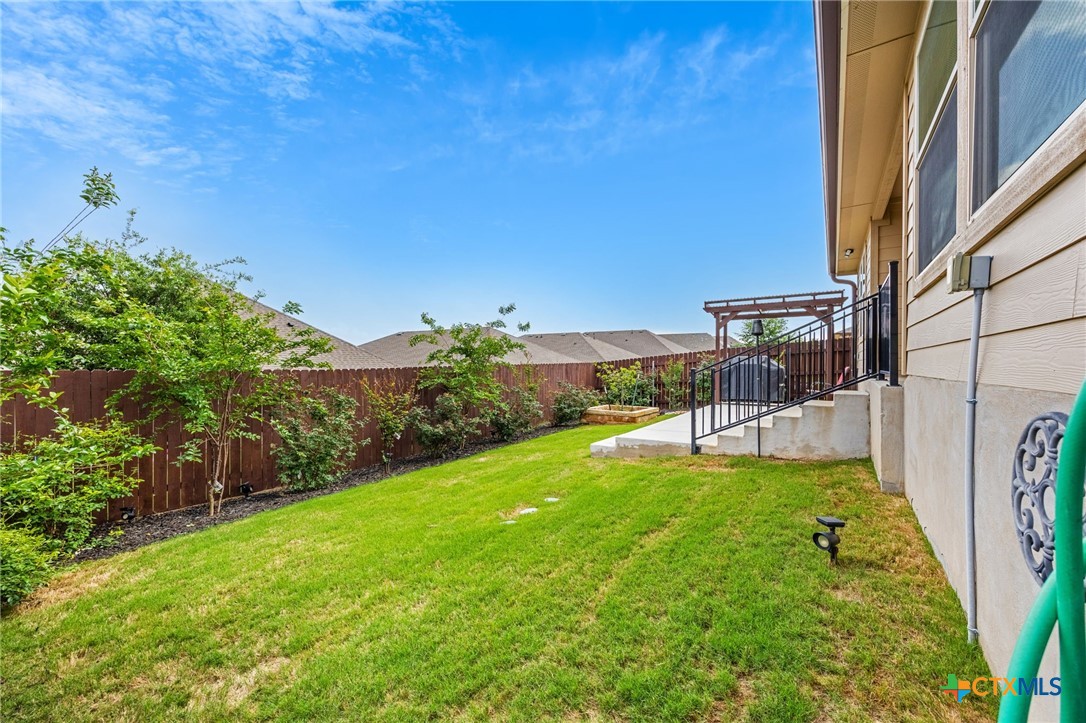 6166 Lavaca Drive Belton, TX 76513 - Photo 33 of 41 a view of yard with swimming pool and green space