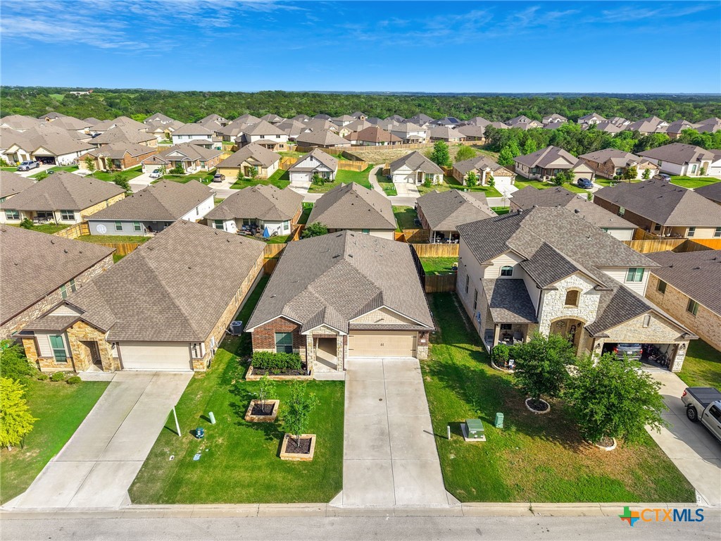 6166 Lavaca Drive Belton, TX 76513 - Photo 37 of 41 an aerial view of residential houses with outdoor space and trees