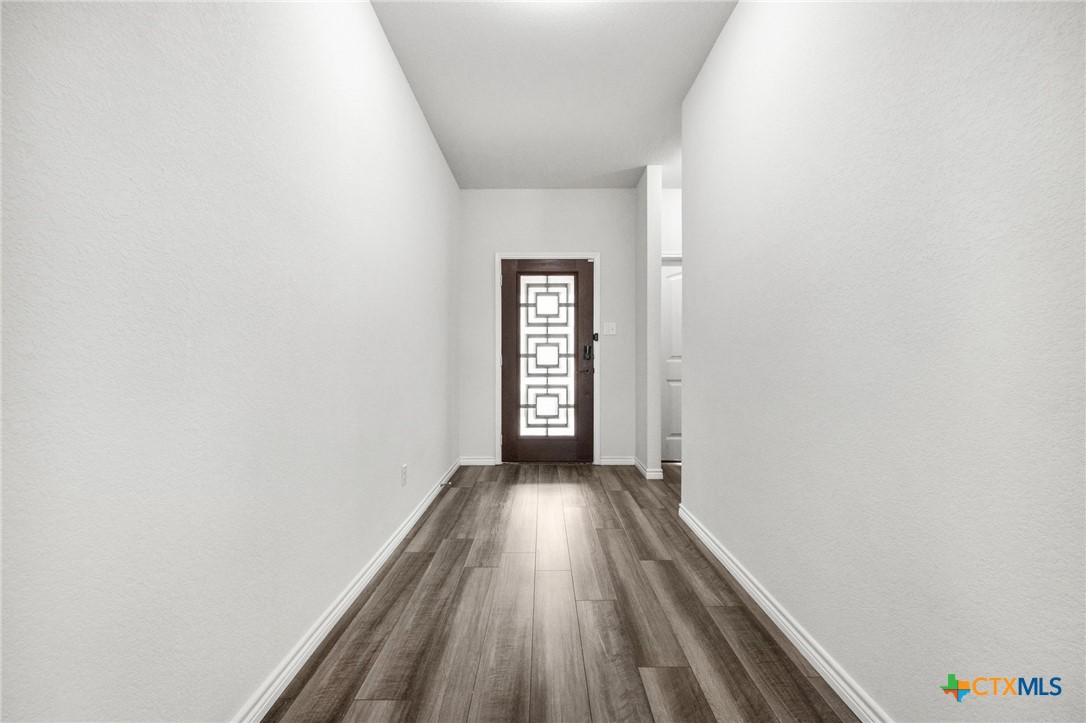 6166 Lavaca Drive Belton, TX 76513 - Photo 6 of 41 a view of wooden floor in an empty room