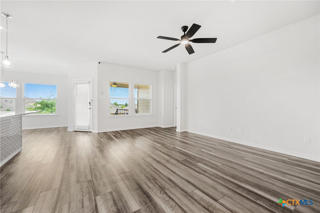 6166 Lavaca Drive Belton, TX 76513 - Photo 10 of 41 wooden floor in an empty room with a window