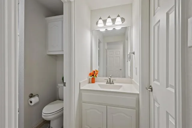 a view of work space with windows and cabinet