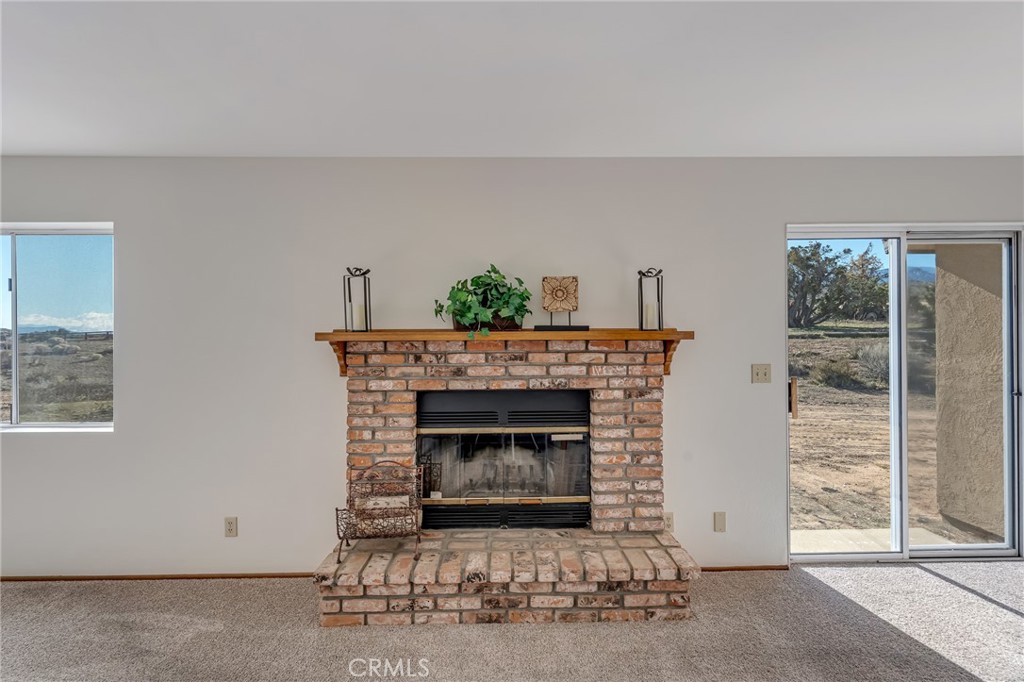8325 Johnson Road Phelan, CA 92371 - Photo 19 of 53 Living room fireplace
