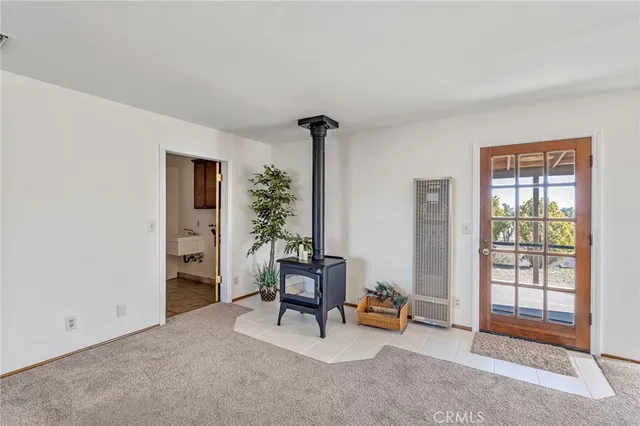 a view of a chairs and table in a room