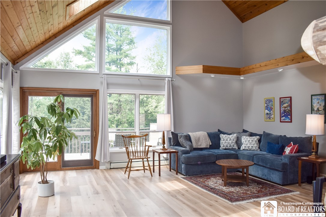 3045 West Oak Hill Road Ellicott, NY 14701 - Photo 10 of 34 Large open Livingroom with Wood floors and spot li