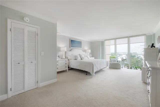 a view of a balcony with chair and a potted plant