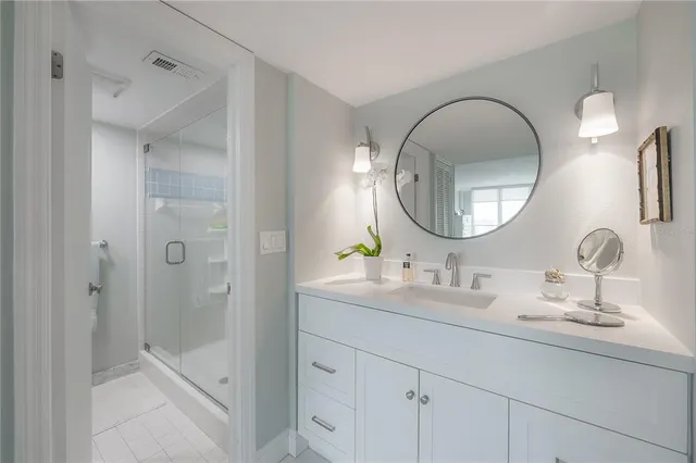 a view of living room filled with furniture and a potted plant
