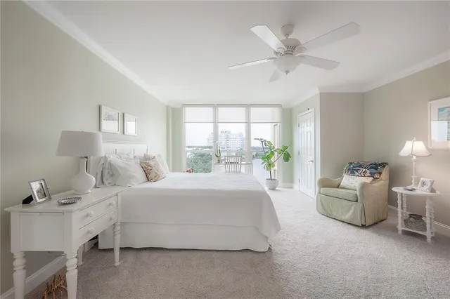 a spacious bedroom with a bed and window