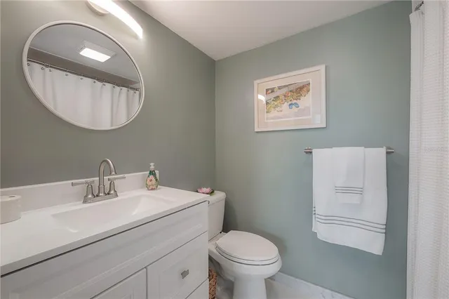 a view of a swimming pool with an outdoor seating