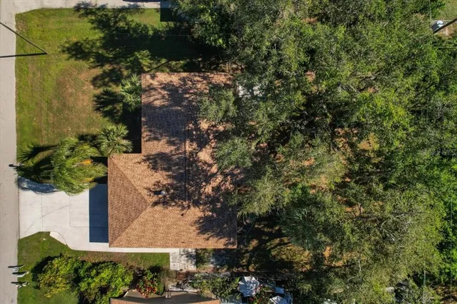 view of a house with a yard