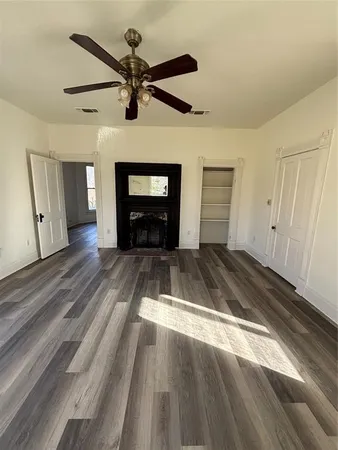 a kitchen with a stove a sink and a refrigerator