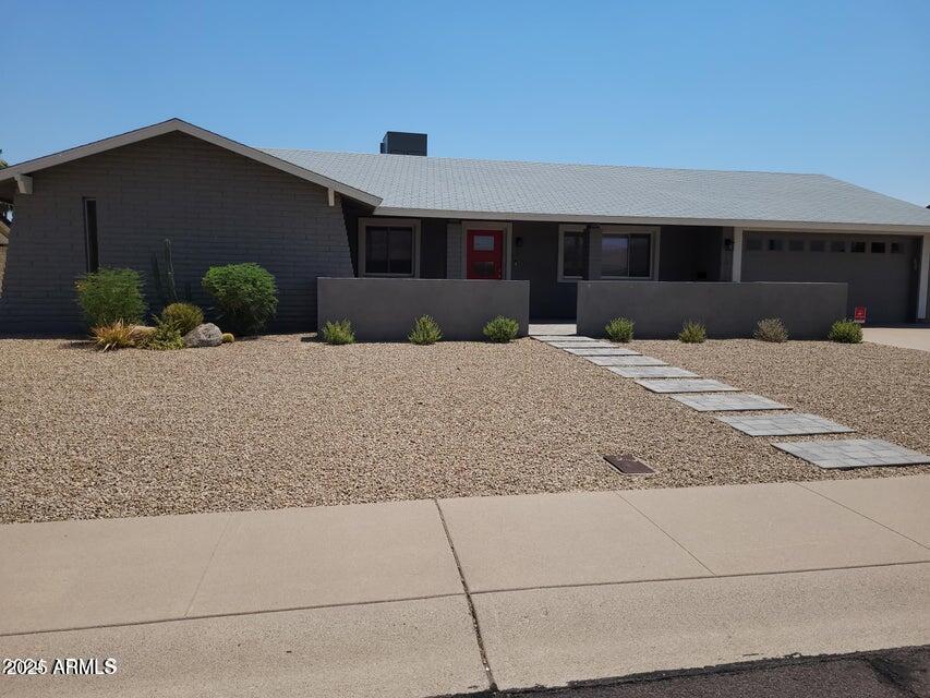 2821 East Cortez Street Phoenix, AZ 85028 - Photo 15 of 18 a front view of a house with a yard