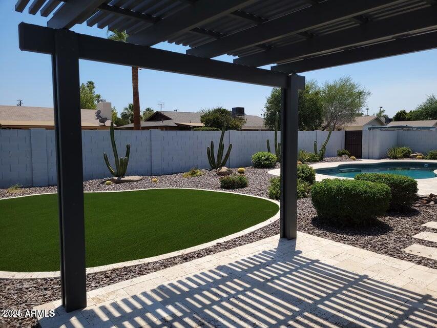 2821 East Cortez Street Phoenix, AZ 85028 - Photo 16 of 18 a view of a chairs and table in the patio