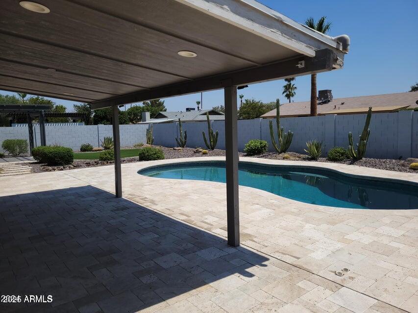 2821 East Cortez Street Phoenix, AZ 85028 - Photo 18 of 18 a view of a backyard with swimming pool