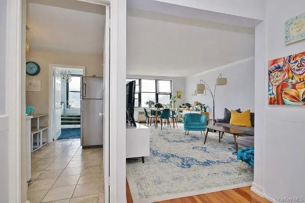 wooden floor view with living room and furniture
