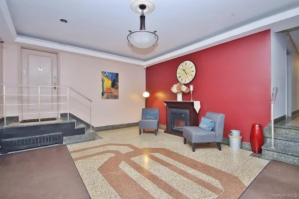 a bedroom with furniture and a ceiling fan
